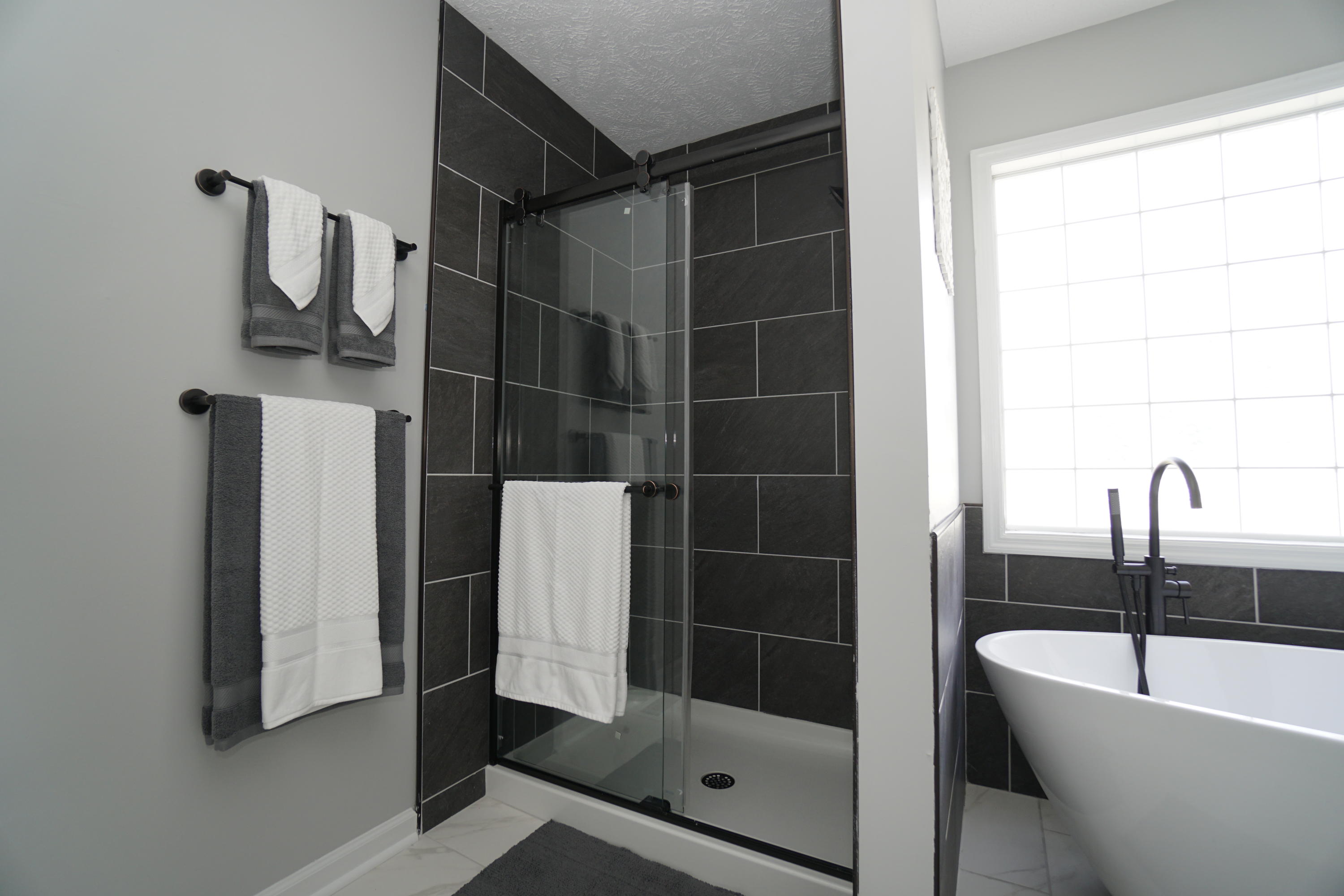 107 Cherian Court Pooler, GA 31322 - Photo 38 of 50 Separate tile shower. Large glass block window brightens up the room.