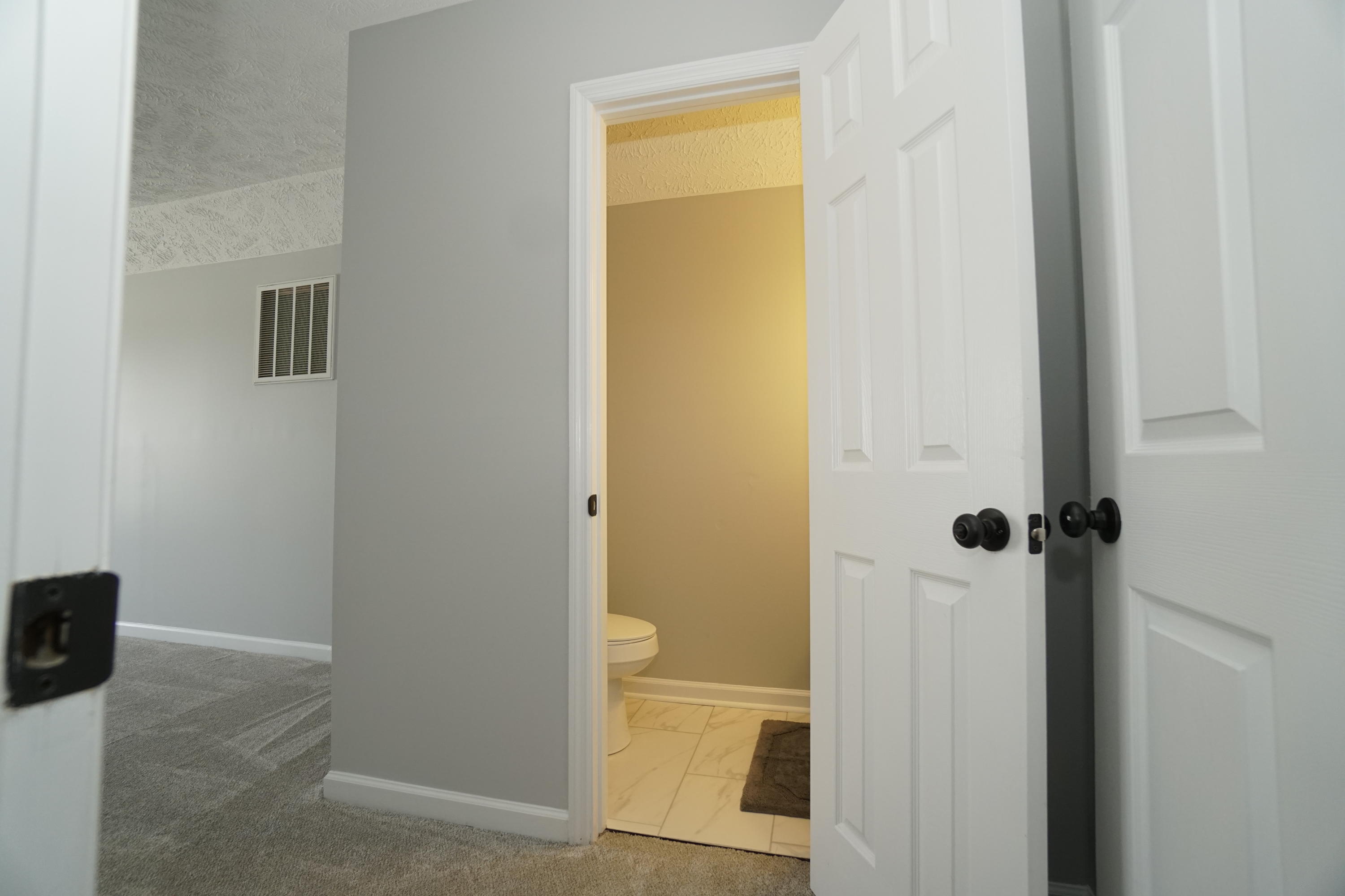 107 Cherian Court Pooler, GA 31322 - Photo 41 of 50 Half bath at the top of the stairs