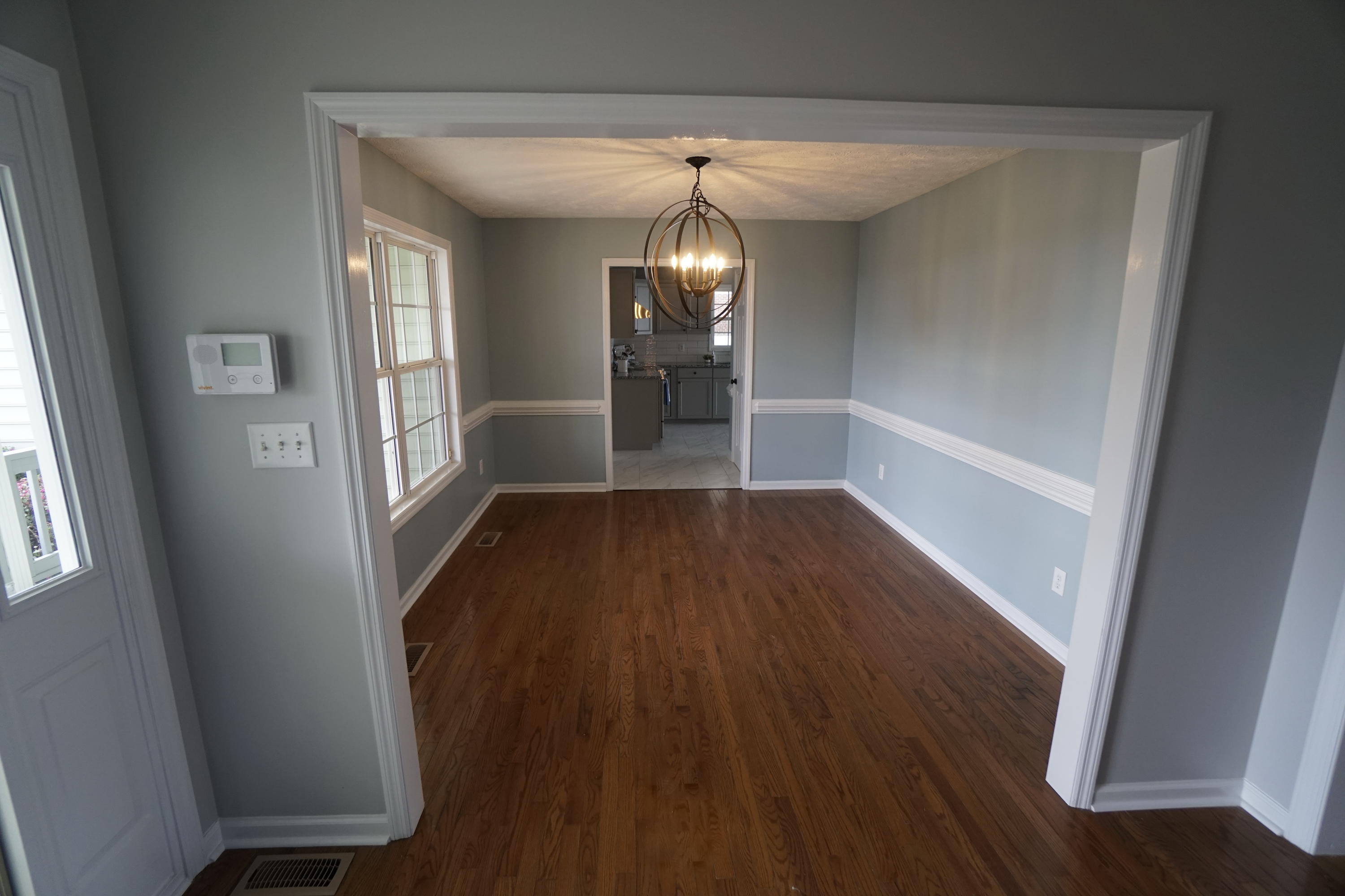 107 Cherian Court Pooler, GA 31322 - Photo 7 of 50 View of the dining room from the foyer. Dining room leads to the spacious kitchen.