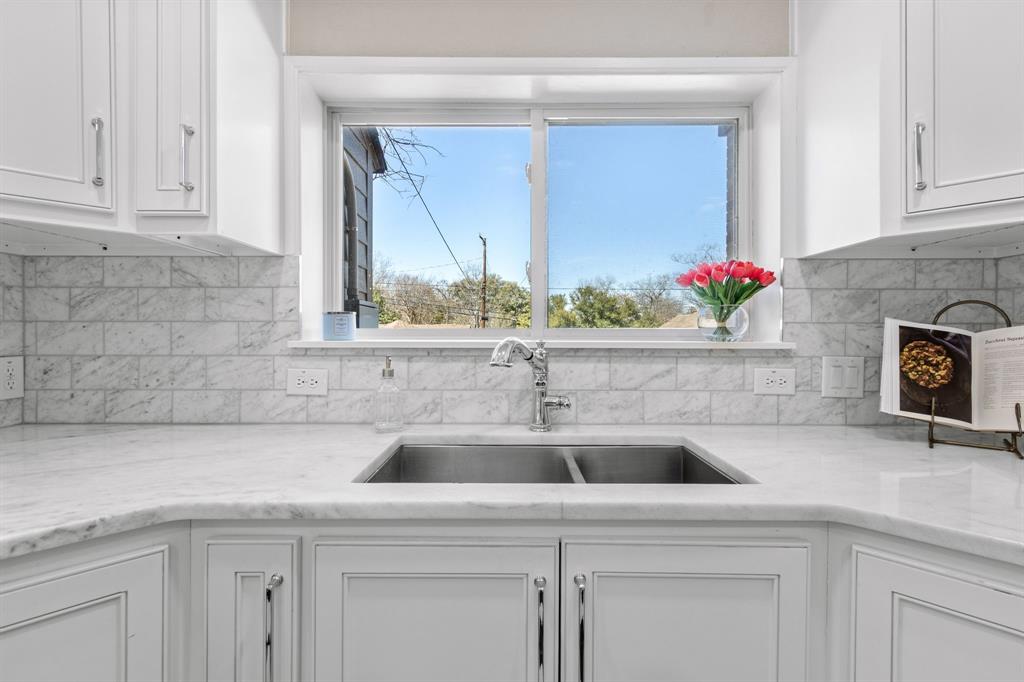 2815 Cumberland Avenue Waco, TX 76708 - Photo 15 of 40 a kitchen with a sink and cabinets