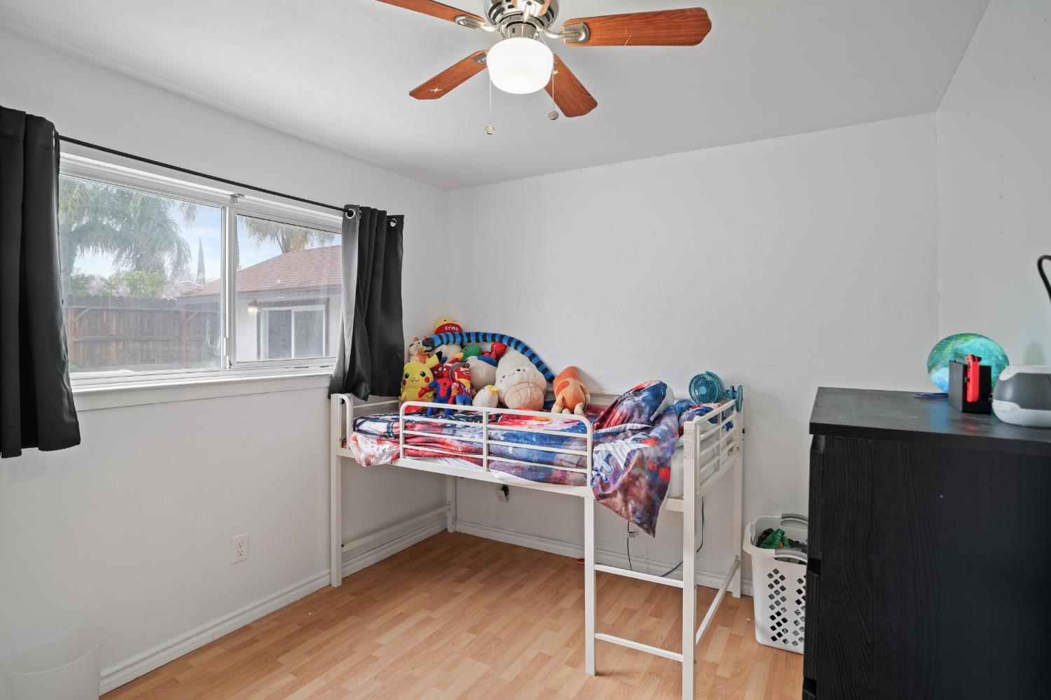 832 Jackson Street Winters, CA 95694 - Photo 26 of 41 bedroom with light wood-style flooring and ceiling fan