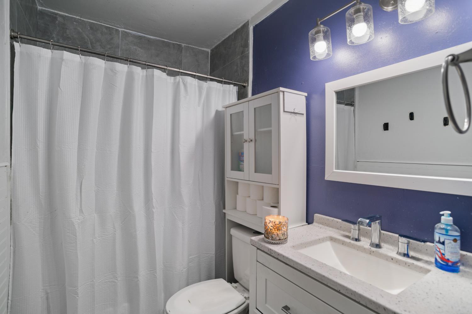 832 Jackson Street Winters, CA 95694 - Photo 27 of 41 full bath featuring a shower with shower curtain and vanity