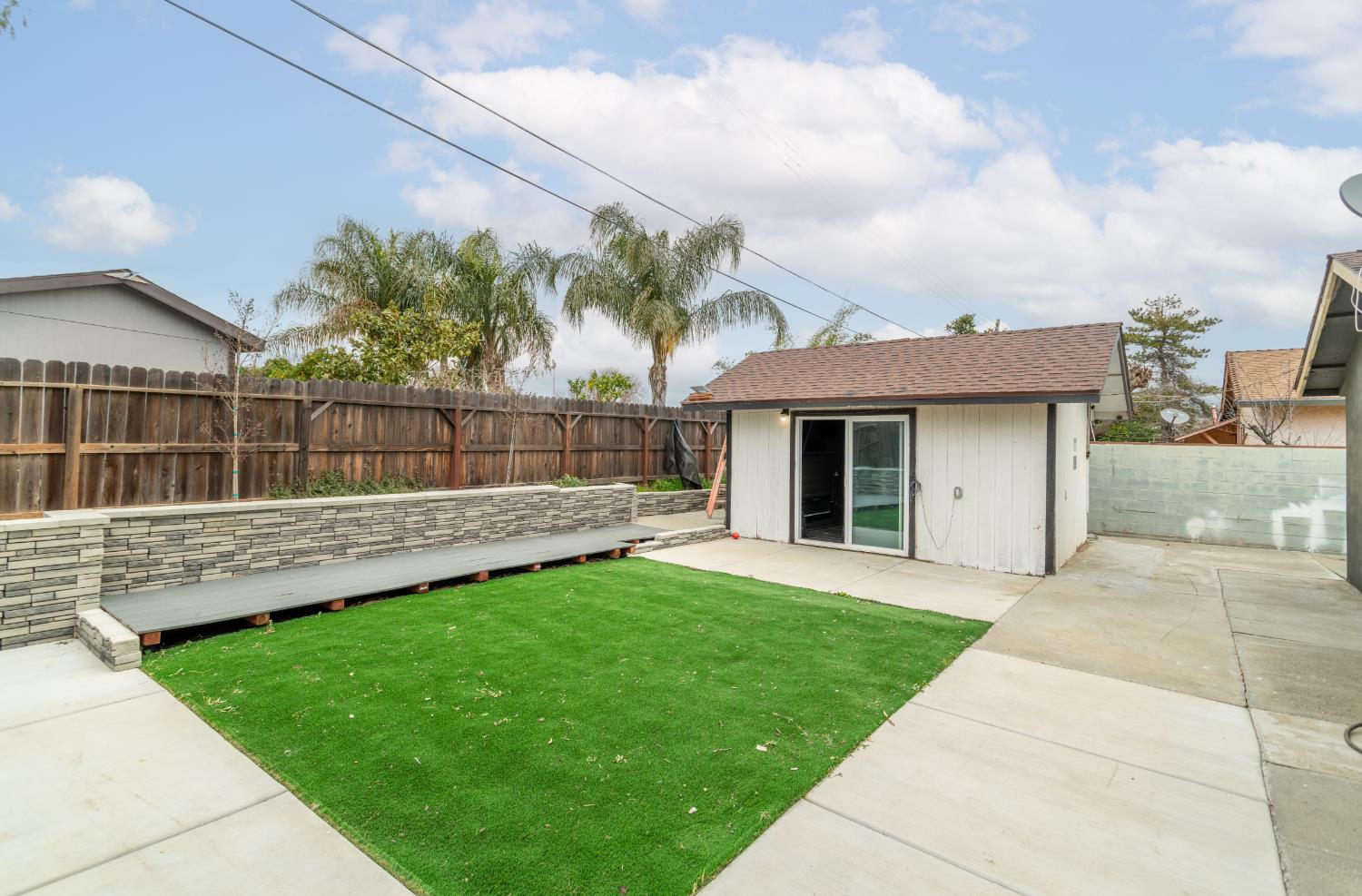 832 Jackson Street Winters, CA 95694 - Photo 34 of 41 fenced backyard featuring a patio and an outdoor structure