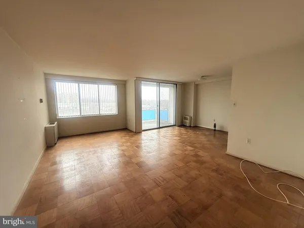 an empty room with windows