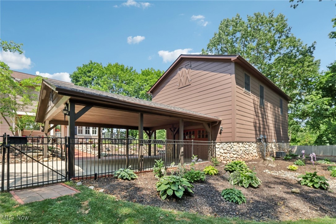 7629 Hopkins Road Mentor, OH 44060 - Photo 46 of 49 Side yard - car port