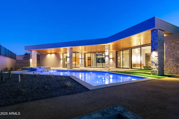 a view of swimming pool with a yard