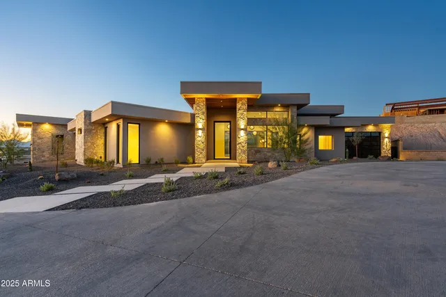 a view of a house with basketball court