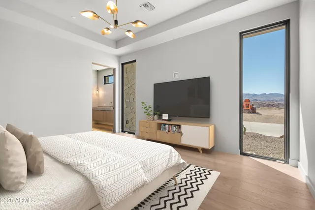 a bathroom with 2 sink and a mirror