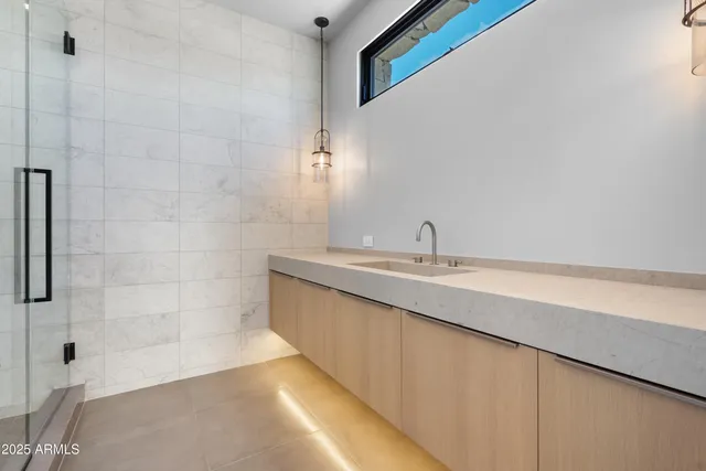 a front view of a house with table and chairs