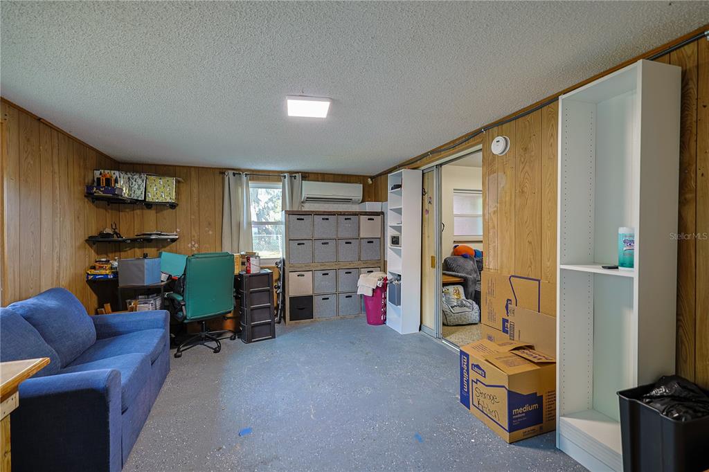 613 Scenic Street Leesburg, FL 34748 - Photo 23 of 38 a view of a livingroom with furniture and a livingroom