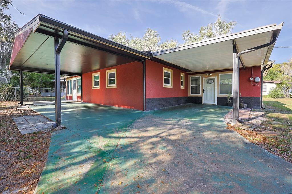 613 Scenic Street Leesburg, FL 34748 - Photo 28 of 38 a front view of house with yard