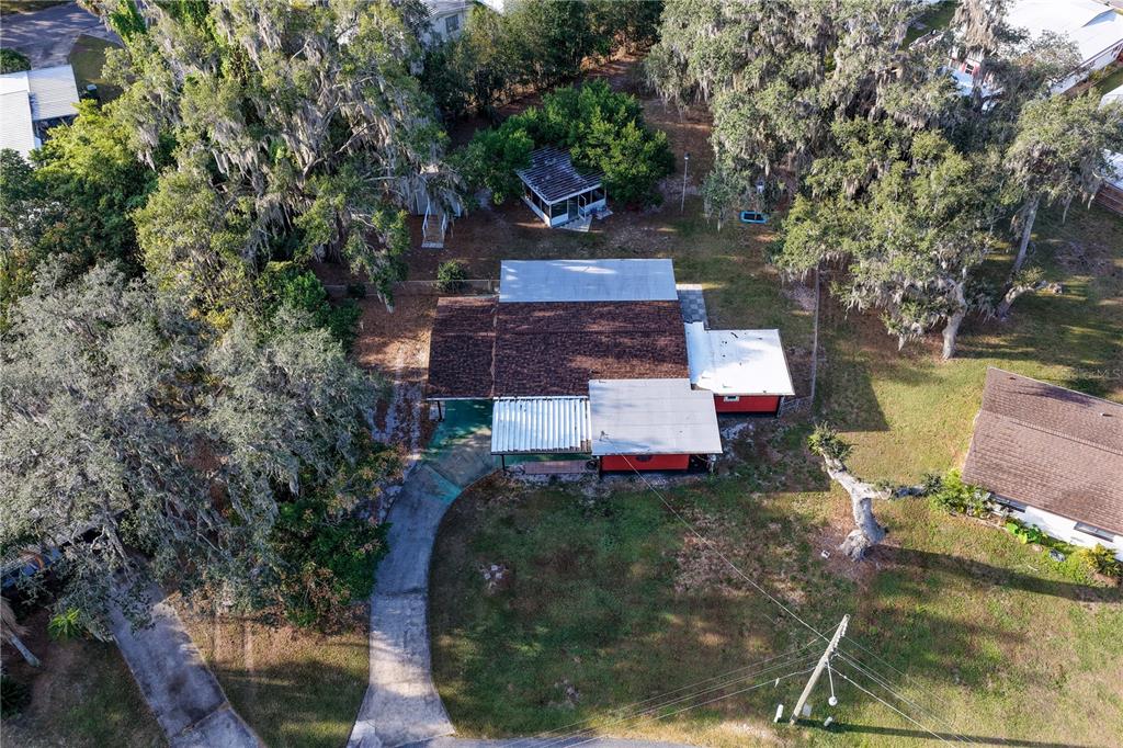 613 Scenic Street Leesburg, FL 34748 - Photo 37 of 38 an aerial view of a house with a yard