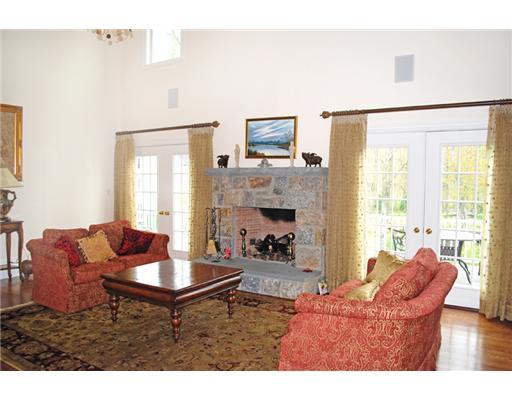 631 Long Ridge Road, Unit 37 Stamford, CT 06902 - Photo 5 of 10 a living room with furniture and a fireplace
