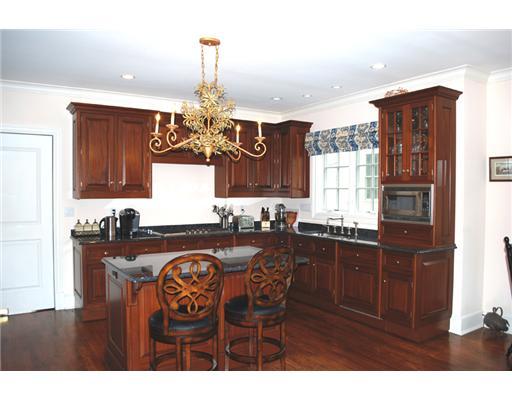 631 Long Ridge Road, Unit 37 Stamford, CT 06902 - Photo 7 of 10 a kitchen with stainless steel appliances granite countertop a stove and cabinets