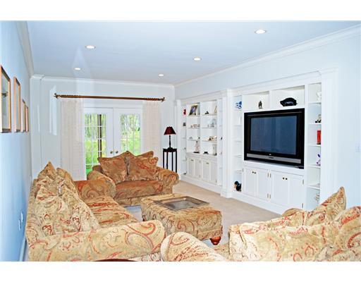 631 Long Ridge Road, Unit 37 Stamford, CT 06902 - Photo 9 of 10 a bedroom with a bed and a flat screen tv