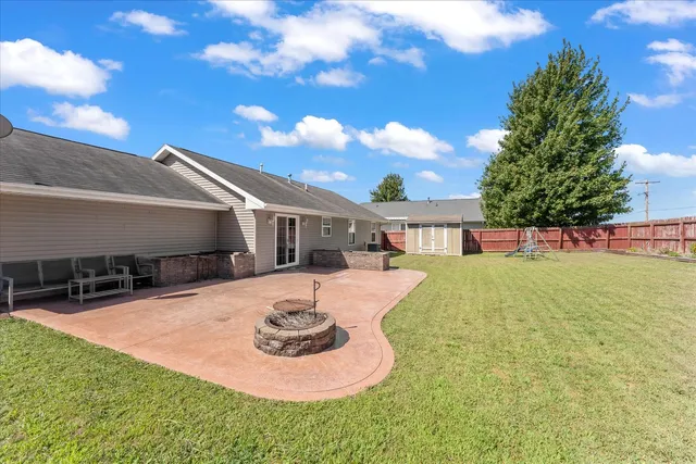 a front view of house with yard outdoor seating and entertaining space