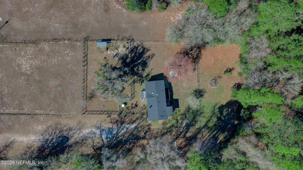 an aerial view of house with outdoor space