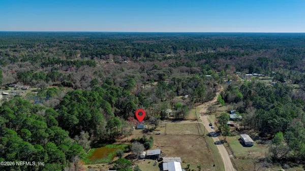 a view of city and green space