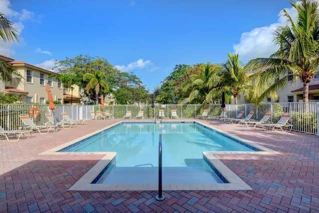 a view of a swimming pool with a patio