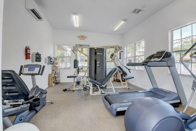 a view of a park with swings and slides