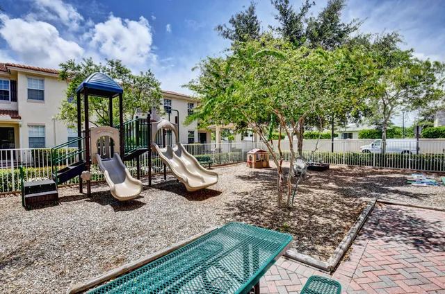 a view of backyard with green space