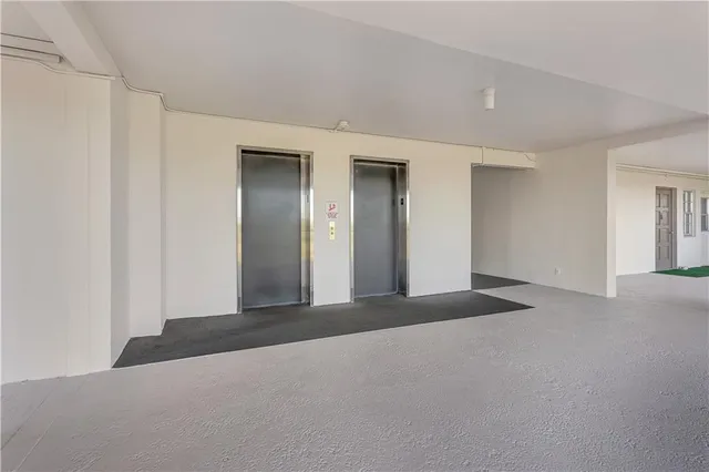 a view of a livingroom with a staircase