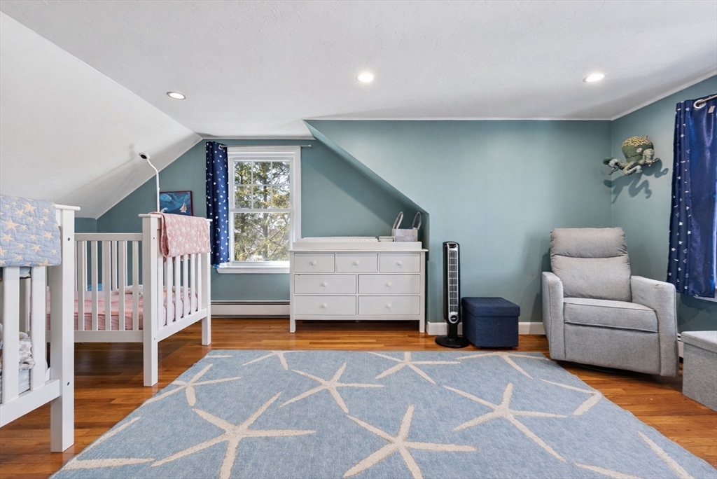 424 Brook Road Milton, MA 02186 - Photo 22 of 41 a living room with furniture and a couch