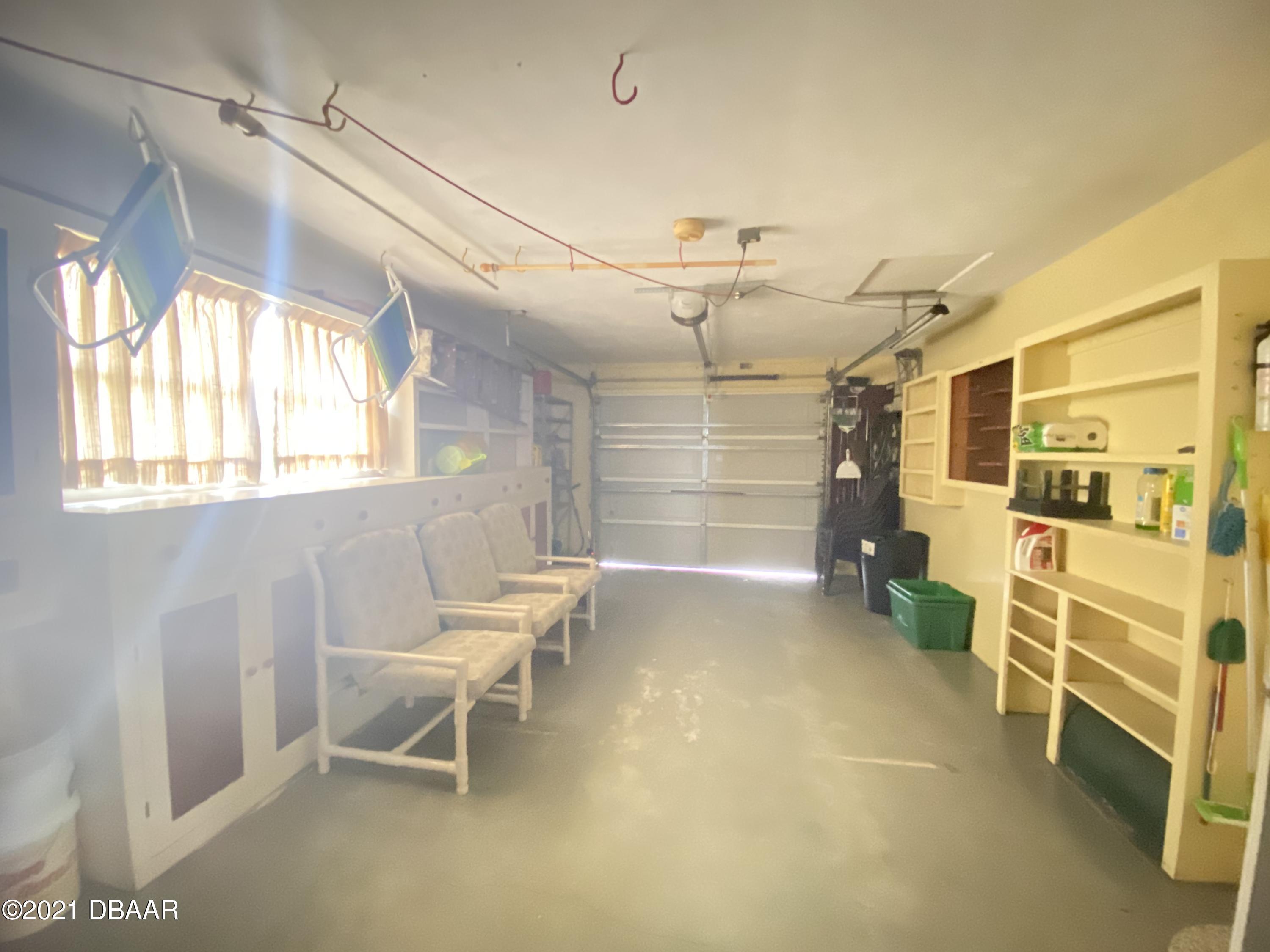 16 Silk Oaks Drive Ormond Beach, FL 32176 - Photo 29 of 37 a view of a room with a chair