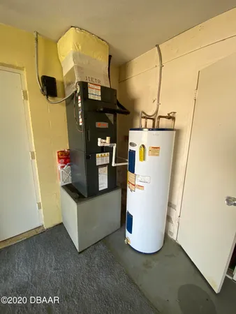 a bathroom with a bathtub and a window