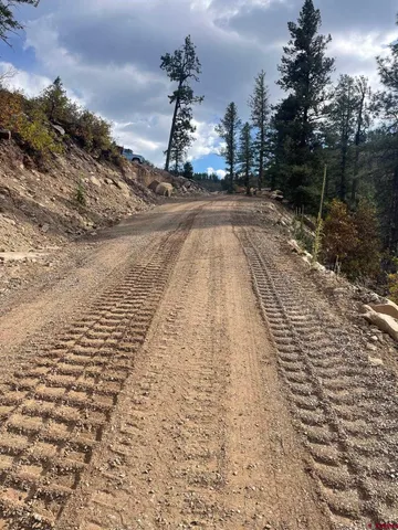 a view of a backyard of the house