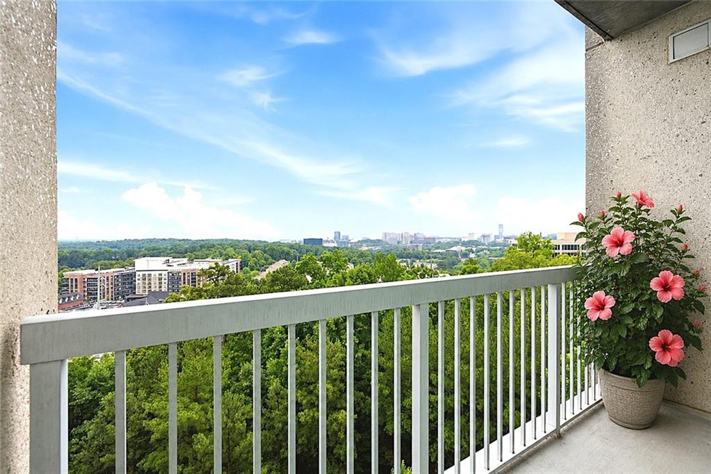 3300 Windy Ridge Parkway Southeast, Unit 1112 Atlanta, GA 30339 - Photo 24 of 43 a view of a city from a balcony