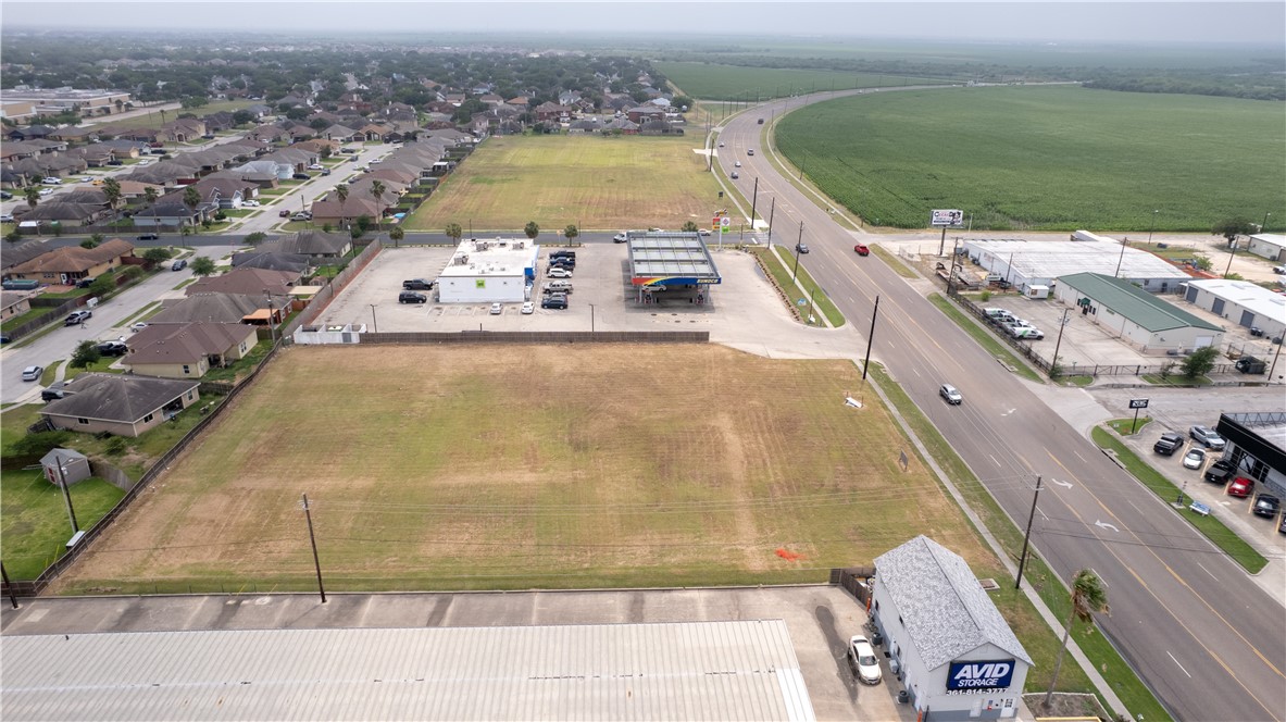 6802 Weber Road Corpus Christi, TX 78413 - Photo 5 of 8 an aerial view of residential houses with outdoor space