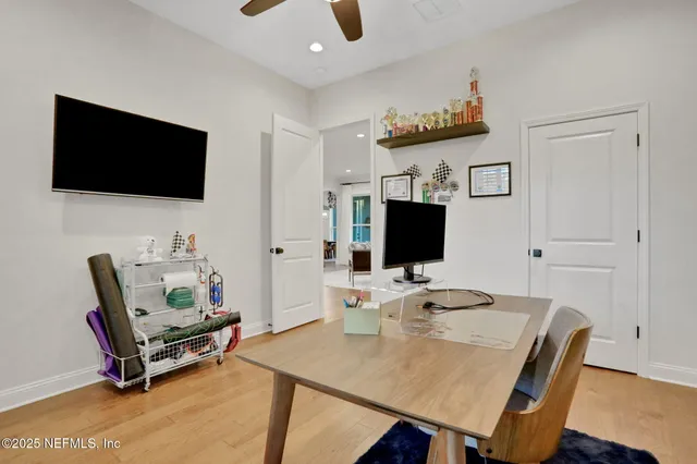 a kitchen with granite countertop stainless steel appliances and wooden cabinets