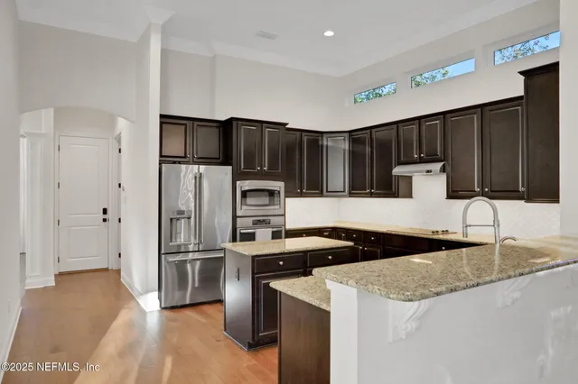 a shelf with books and knick knacks on it