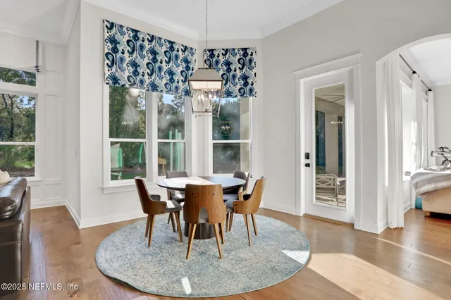 a living room with furniture fireplace and flat screen tv