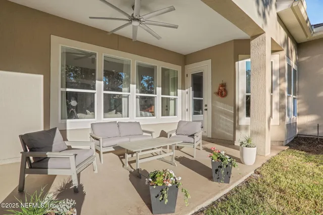 a view of an entryway with a flower pot
