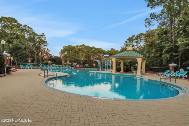 a view of a house with swimming pool