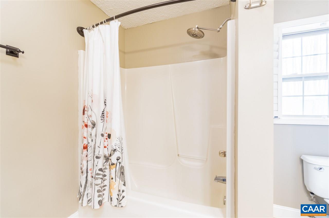 3124 Martin Kings Road Charlottesville, VA 22902 - Photo 25 of 45 a bathroom with a shower and a window