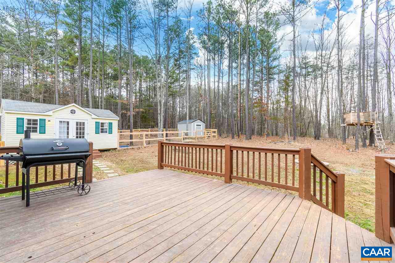 3124 Martin Kings Road Charlottesville, VA 22902 - Photo 6 of 45 a view of a house with wooden deck and furniture