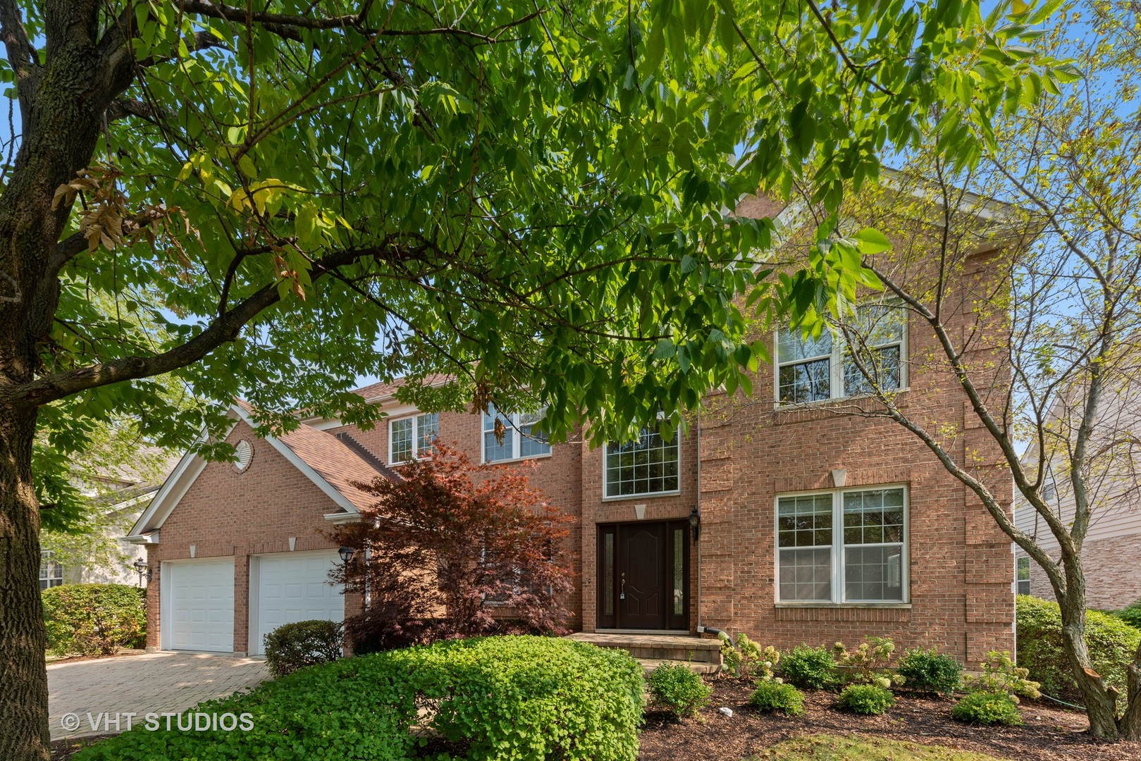 1743 Stanwich Road Vernon Hills, IL 60061 - Photo 1 of 20 front view of a house with a tree