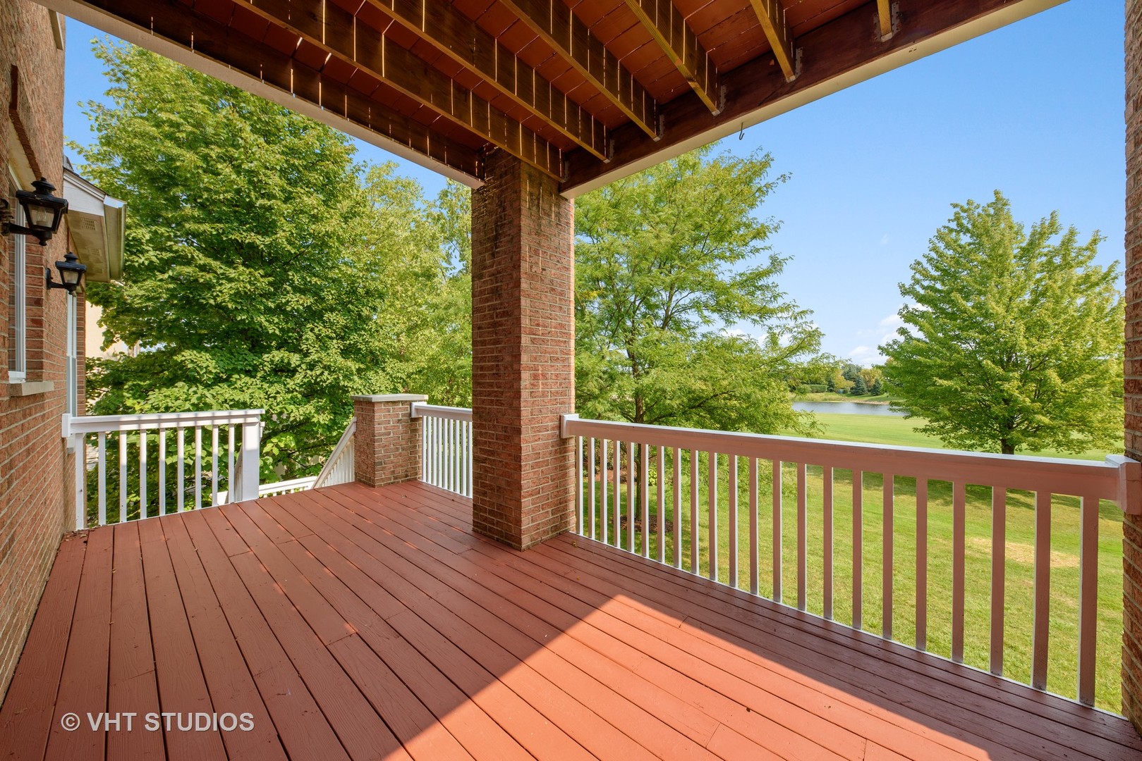 1743 Stanwich Road Vernon Hills, IL 60061 - Photo 17 of 20 a balcony with wooden floor and outdoor space