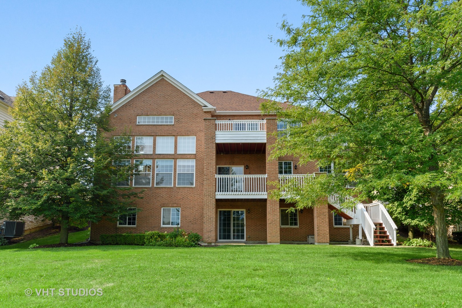 1743 Stanwich Road Vernon Hills, IL 60061 - Photo 19 of 20 a front view of house with yard and green space