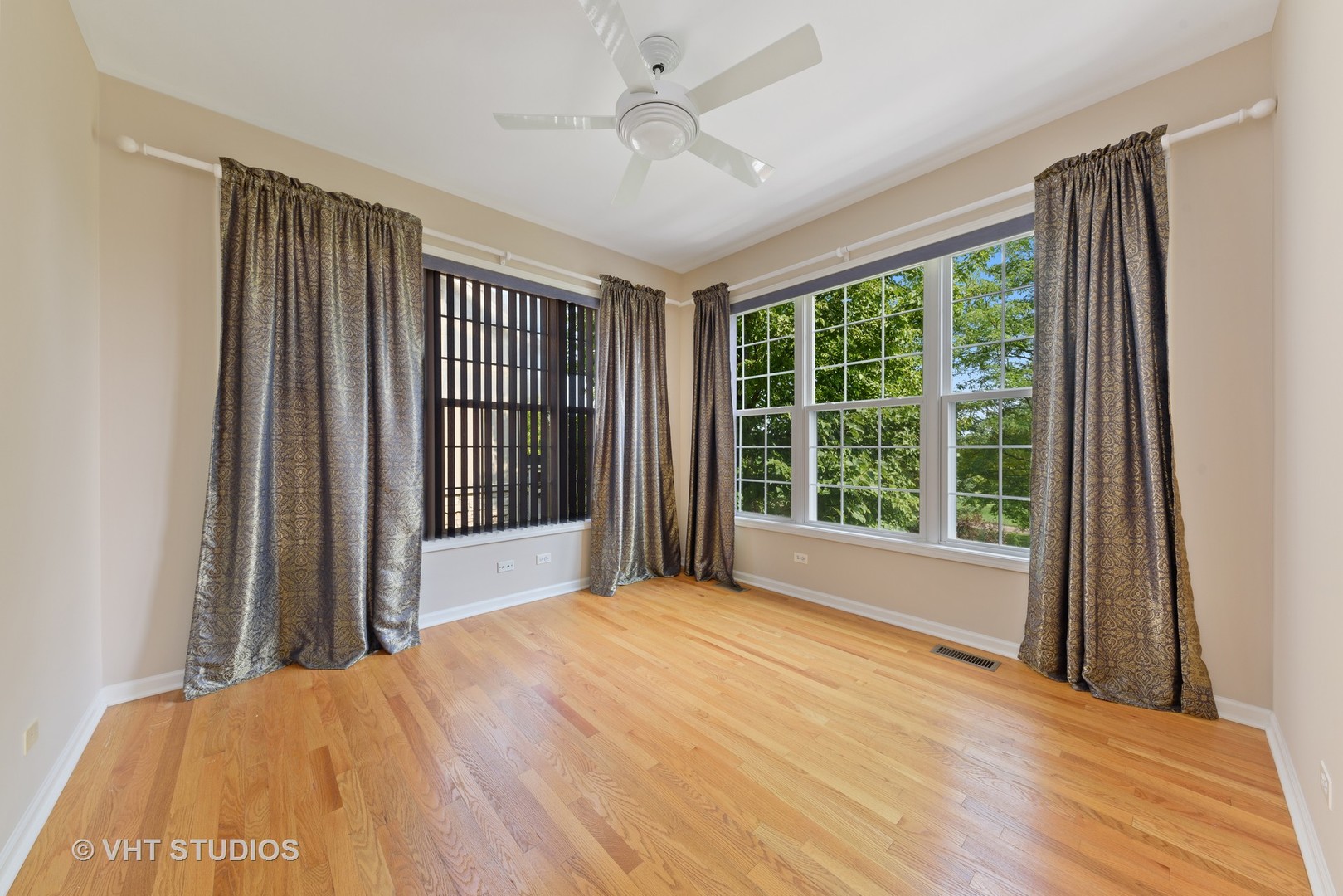 1743 Stanwich Road Vernon Hills, IL 60061 - Photo 8 of 20 a bedroom with a bed and a large window