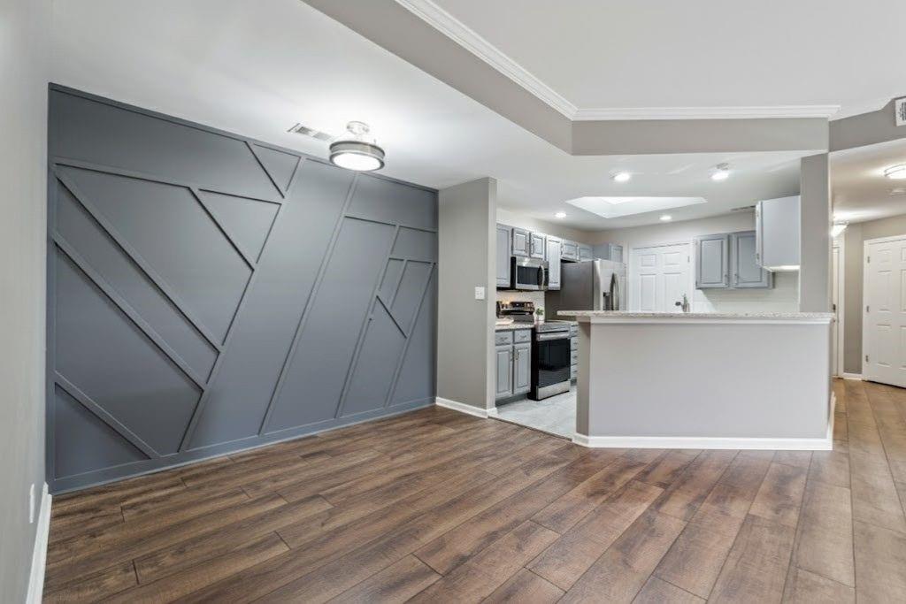 1037 McGill Park Avenue Northeast Atlanta, GA 30312 - Photo 15 of 46 a view of kitchen with wooden floor