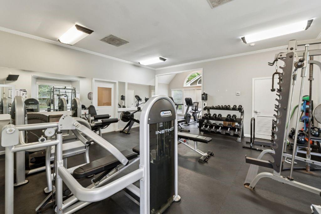 1037 McGill Park Avenue Northeast Atlanta, GA 30312 - Photo 41 of 46 a view of a room with gym equipment