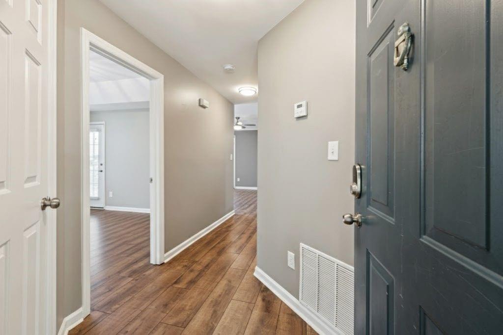 1037 McGill Park Avenue Northeast Atlanta, GA 30312 - Photo 6 of 46 a bathroom with a bathtub and a shower