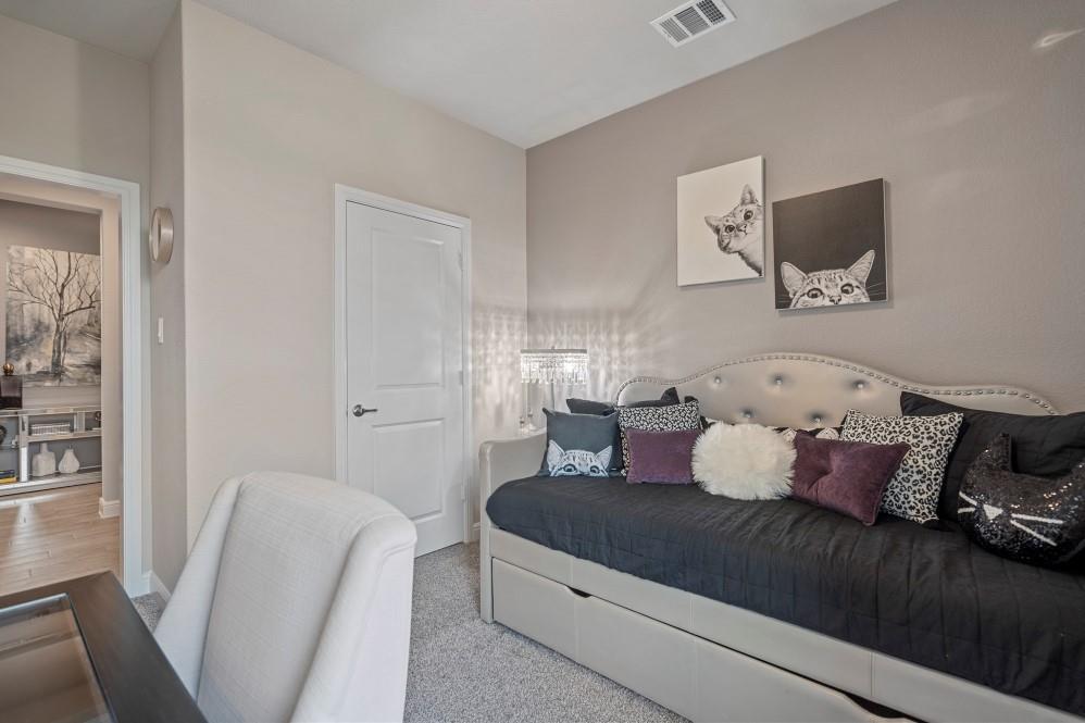 105 Ringtail Drive Rhome, TX 76078 - Photo 27 of 40 a living room with furniture and a couch