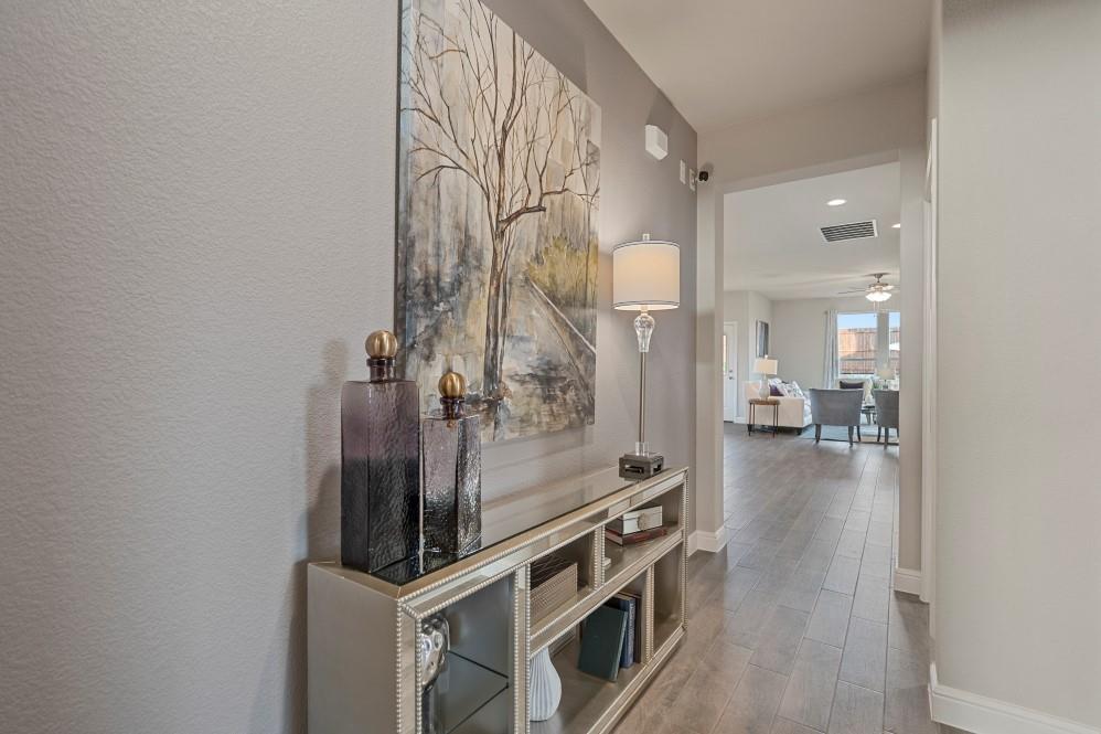 105 Ringtail Drive Rhome, TX 76078 - Photo 36 of 40 a view of a kitchen from the hallway