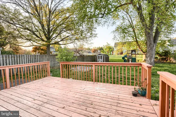 a view of a wooden roof deck
