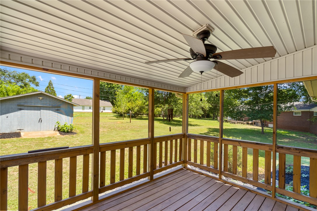 1509 869 Anderson, SC 29621 - Photo 35 of 45 Enjoy the outdoors from this screened porch with ceiling fan and a view of the backyard.